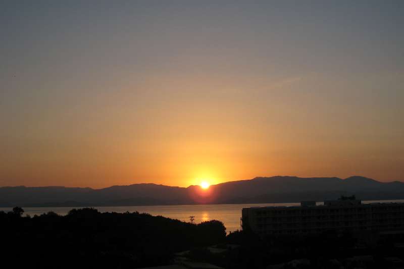 FH_0806_334_IX0224.jpg - Grecotel Eva Palace - view from room 315 - sunrise over the mountains of Albania